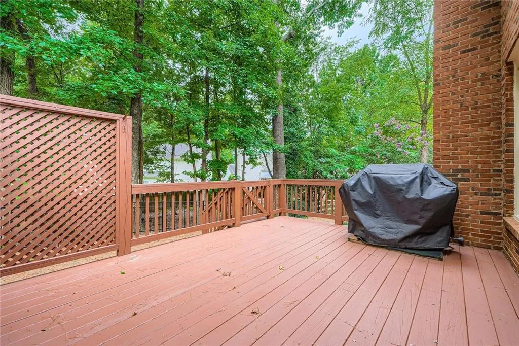 Wooden deck with a grill