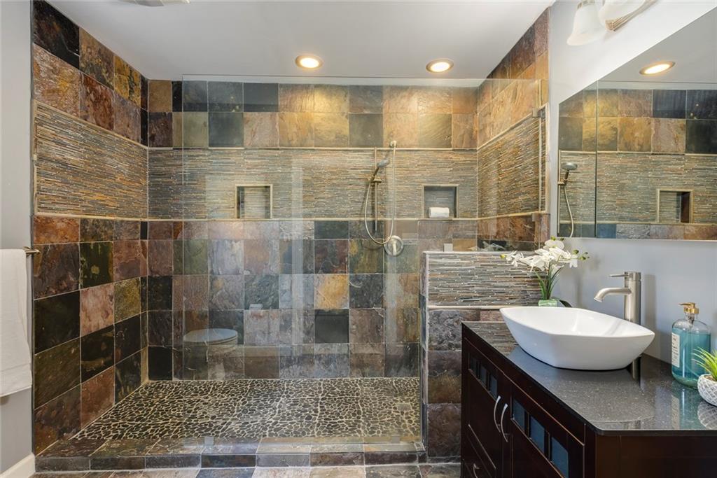 Full bath on main level for guest + great shower to wash pets!