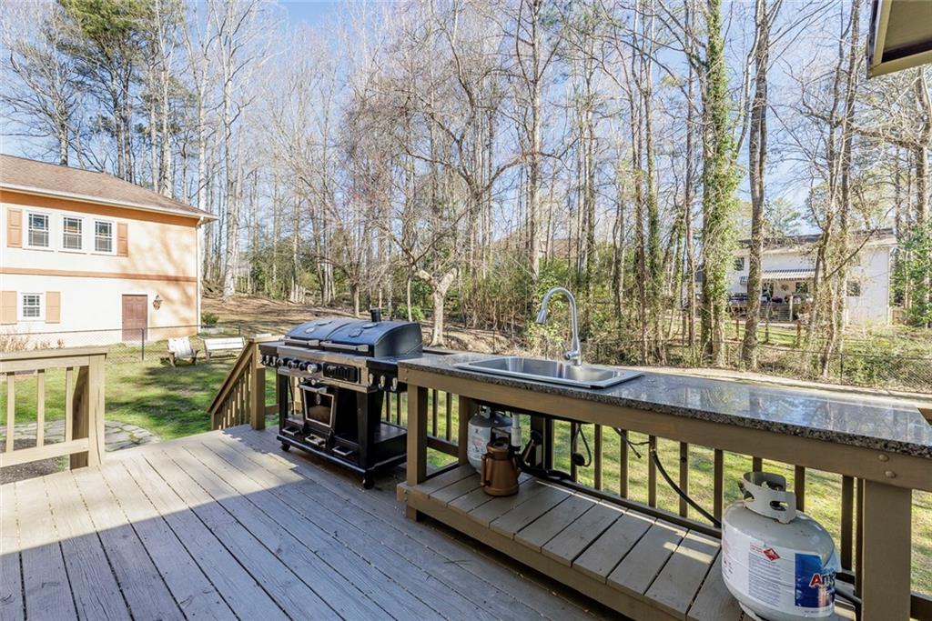 Pit Master Grill Included + Prep Island with Sink.