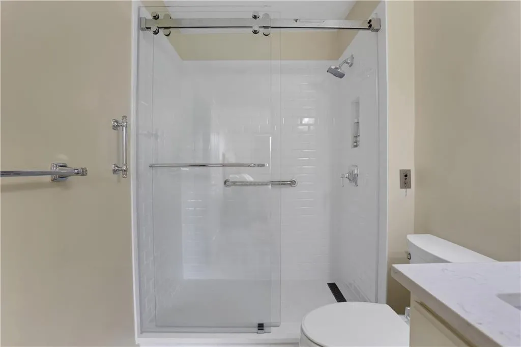 Safety is paramount with a walk in shower and grab bars.