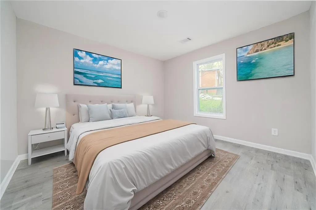 Bedroom with light wood-style floors