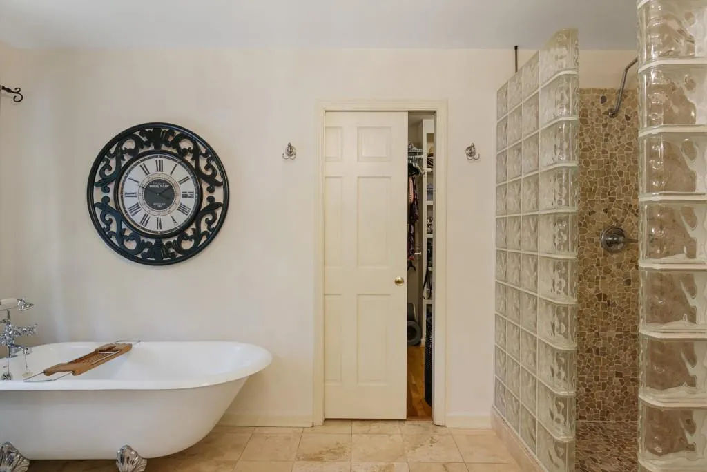 Separate tub and shower.