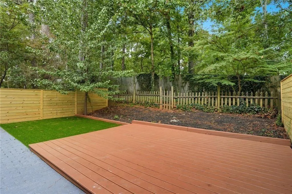 Deck featuring a fenced backyard