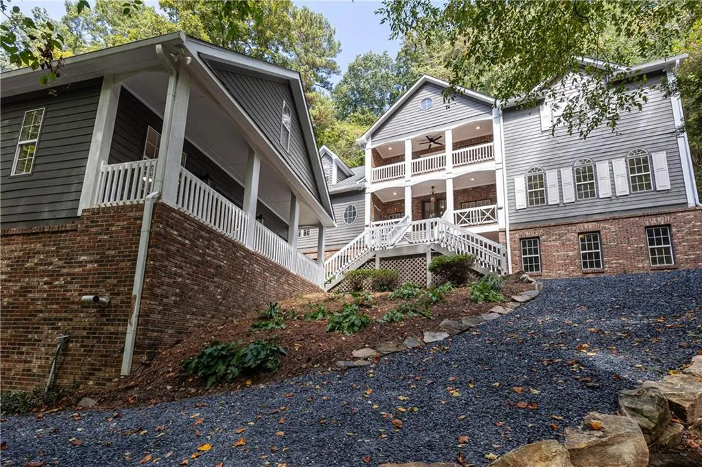 Front view with slate drive leading to main house