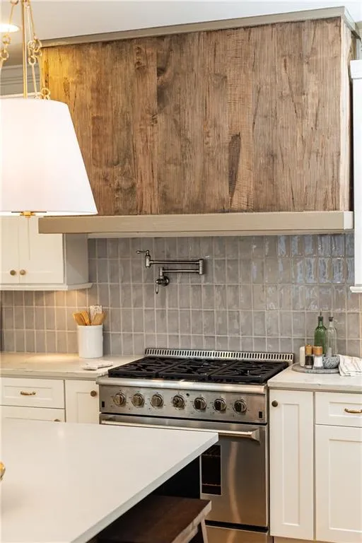 Stained wood reeded oversized range hood