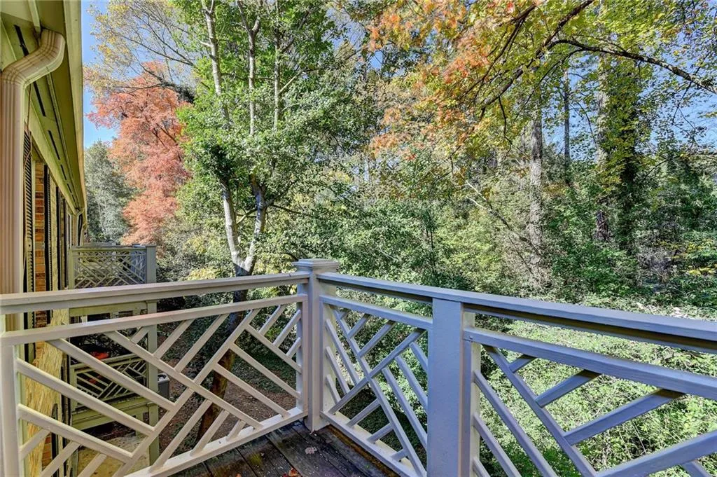 Balcony with view of scattered trees
