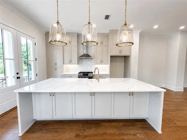 Gorgeous pendant lights add a special touch to the home's decor