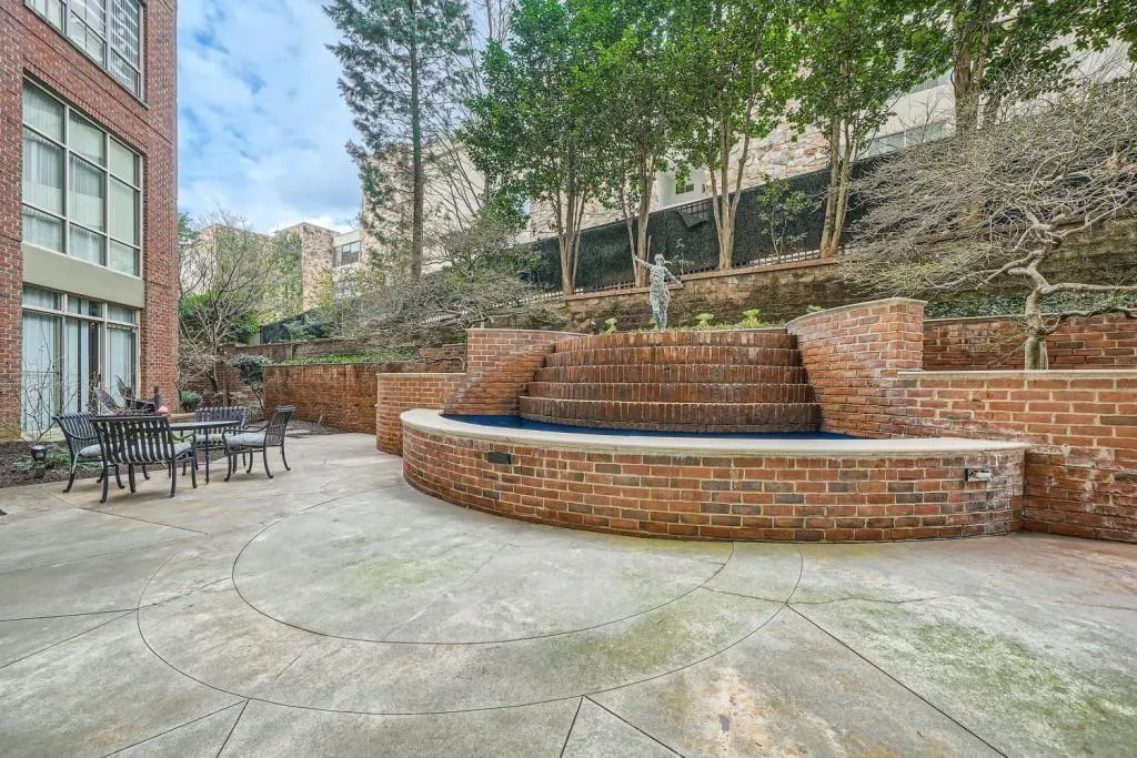 Just outside in the courtyard you can relax by the fountain, enjoy the beautifully landscaped garden and grill dinner all at the same time!!