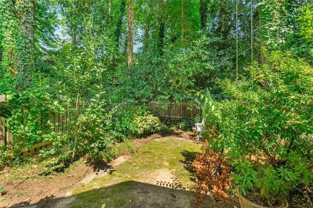 Fenced backyard for the perts! Good area for the g