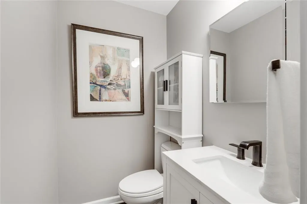 This half bath is perfect for guest. Located off the secondary bedroom.