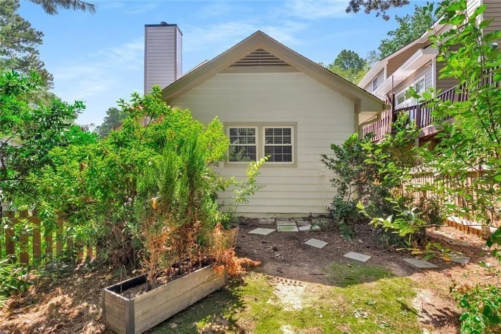 The deck wraps around the side of the house provid