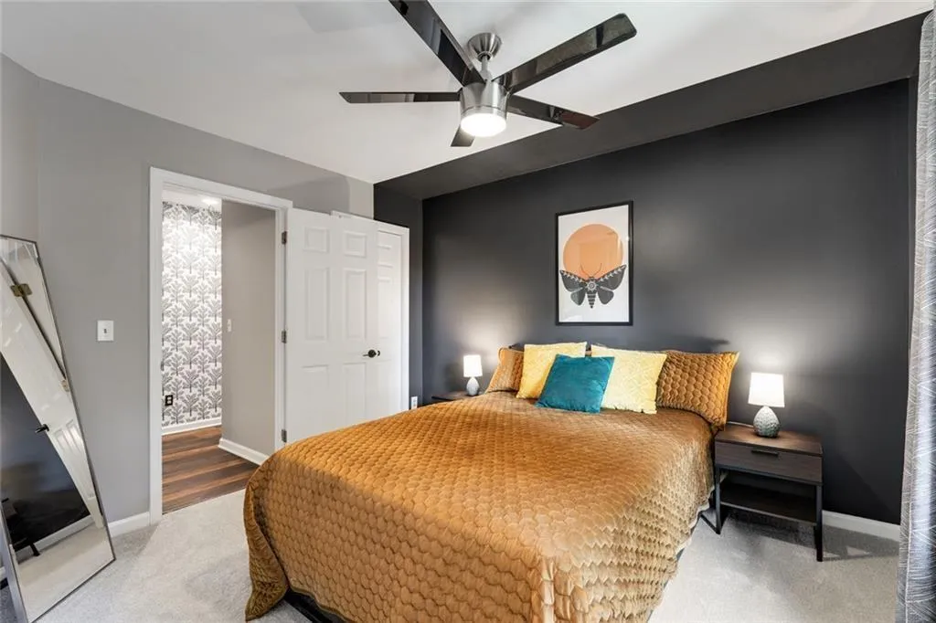 Custom paint finish and new carpet too! There is a closet located behind the door.