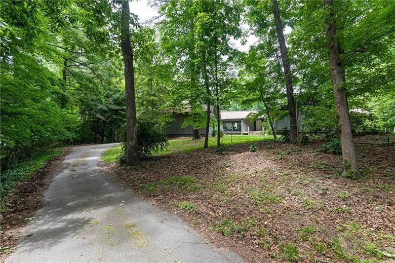 1165 W Garmon Road, Atlanta, Georgia 30327, 4 Bedrooms Bedrooms, ,3 BathroomsBathrooms,Residential,Sold,1165 W Garmon Road,6900504