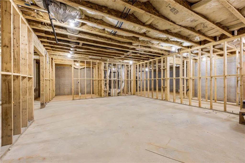 Huge unfinished basement with endless possibilities — ideal for a future media room, recreation area, or personalized luxury expansion. Huge unfinished basement with endless possibilities — ideal for a future media room, recreation area, or personalized luxury expansion.