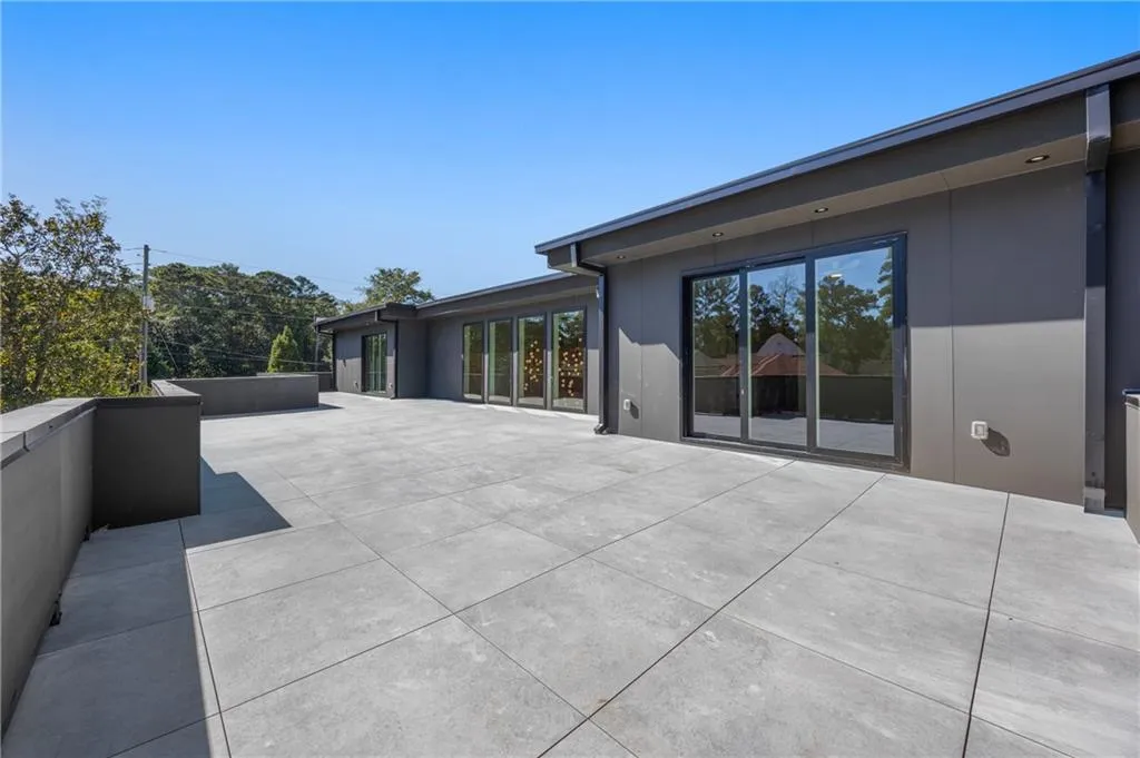 Look at this incredible outdoor rooftop balcony with 36x36 pavers, overlooking the pool — the perfect space for entertaining and relaxing in modern luxury. Look at this incredible outdoor rooftop balcony with 36x36 pavers, overlooking the pool — the perfect space for entertaining and relaxing in modern luxury.