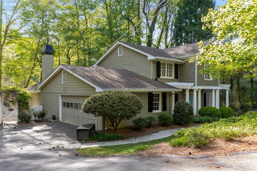 The garage provides parking for two vehicles, with additional space for guests thanks to a convenient parking pad.
