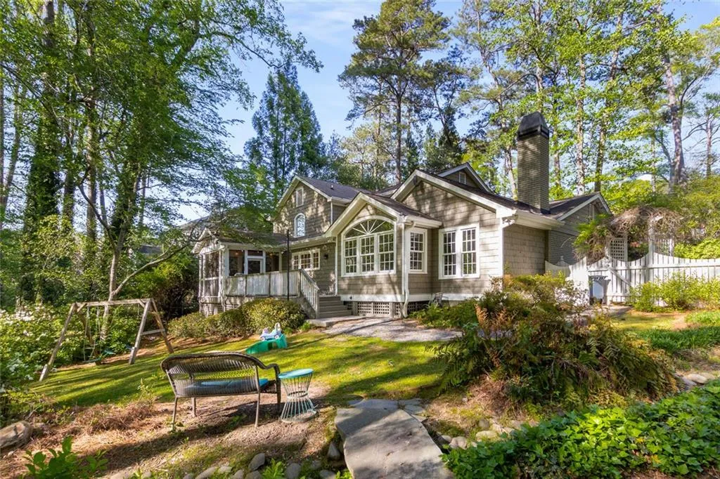 The backyard is your own private retreat—relax on the screened porch, fire up the grill on the back deck, and take advantage of the level, fenced yard that's perfect for play. The ideal spot to soak up the rest of summer!