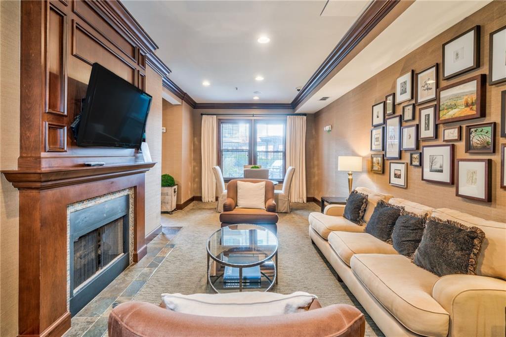 Tiled living room with crown molding