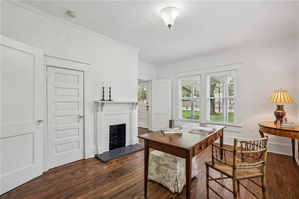 2nd Bedroom facing front of house, featuring decorative fireplace