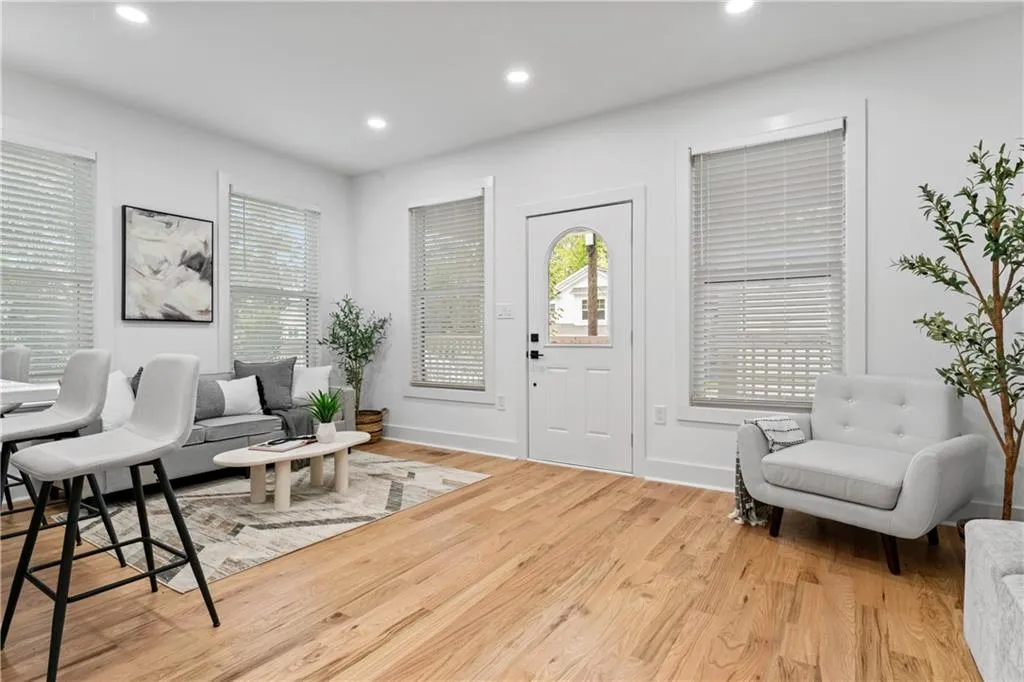 Entrance foyer with recessed lighting and light wood-style flooring