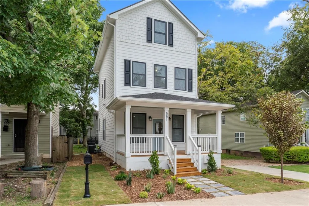 View of front of home featuring covered porch