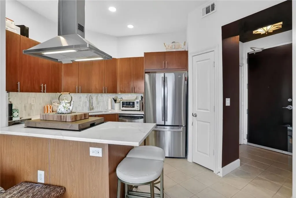 Loads of cabinets including a pantry and counterspace for all your cooking and entertaining needs with no obstructed view.