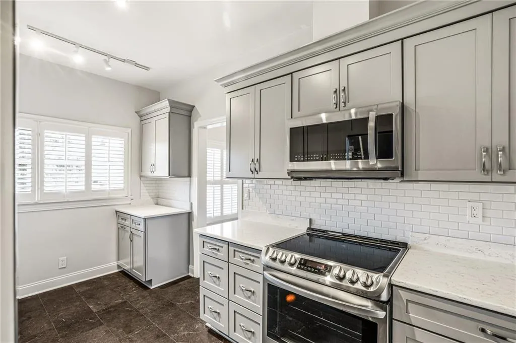 New kitchen with all new cabinetry, appliances and lighting.