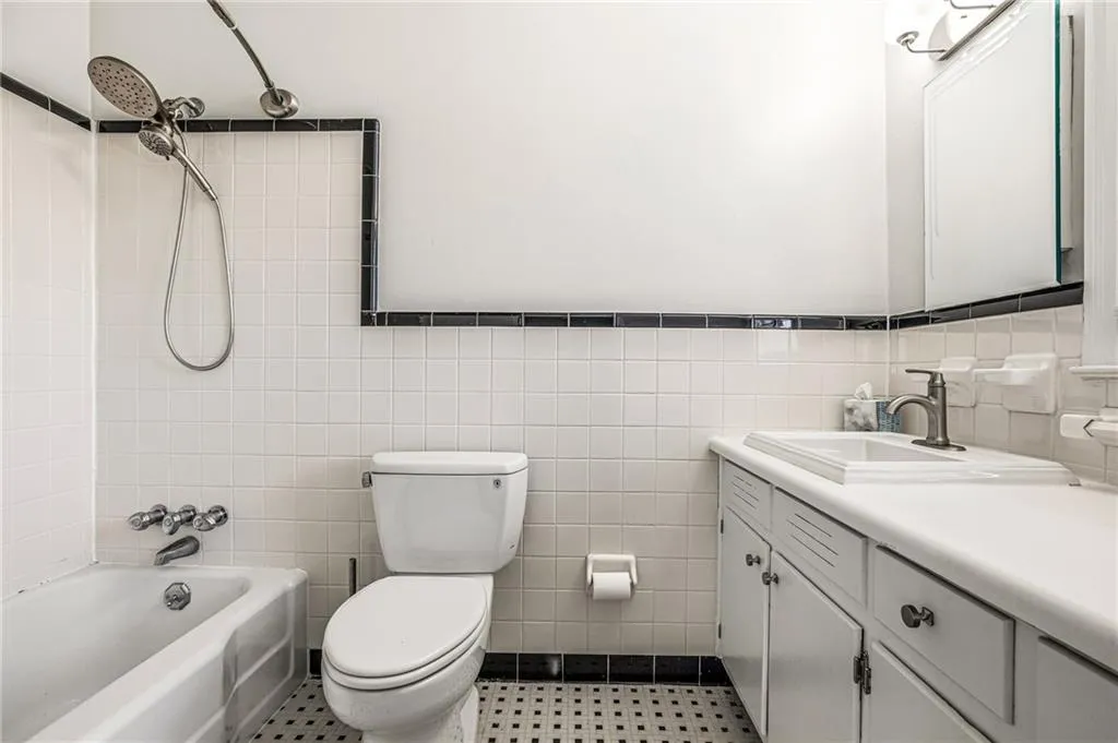 Full bath in bedroom one.