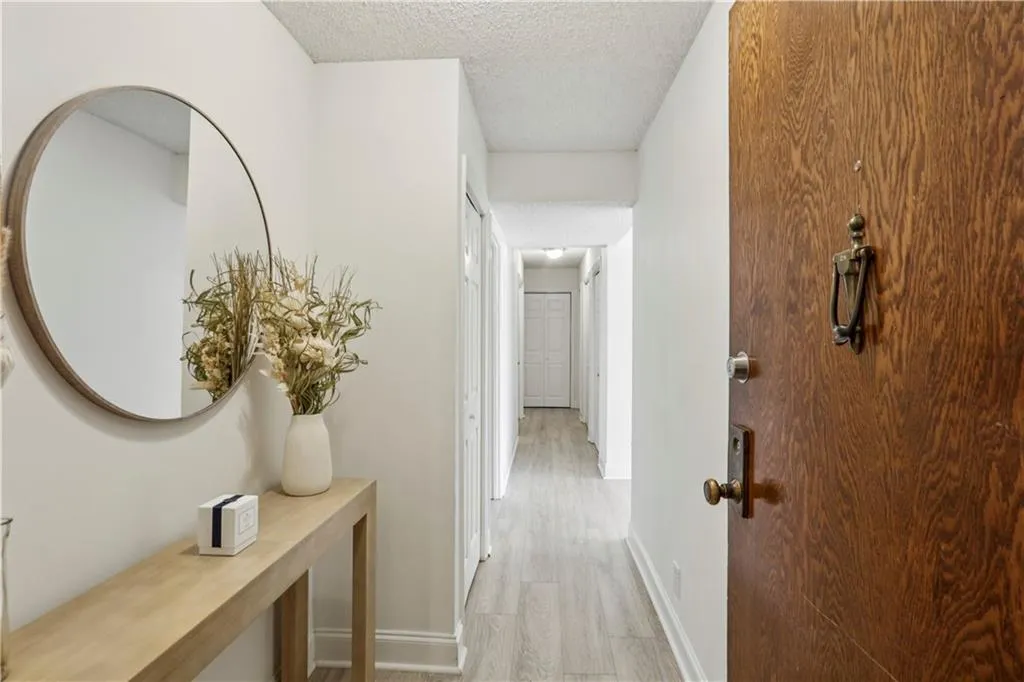 Entry foyer with coat closet on your left