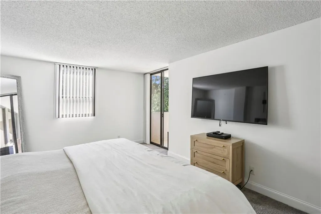 Primary bedroom accommodates a king bed and room for sitting area