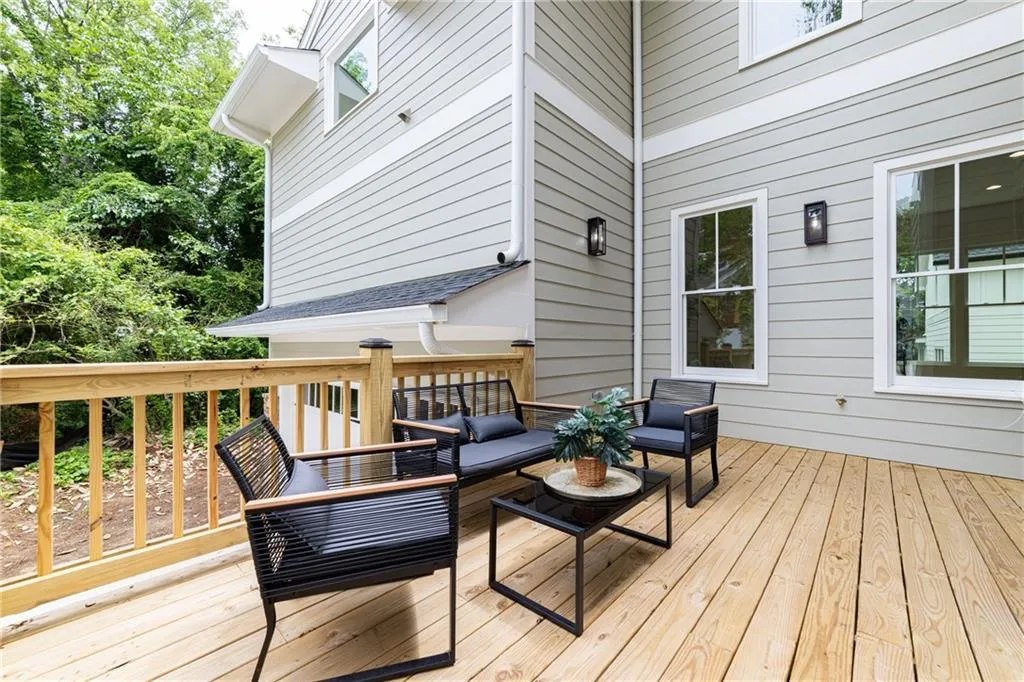 Wooden terrace featuring outdoor lounge area