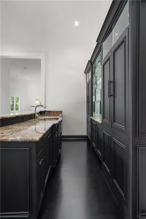 Bathroom with baseboards and recessed lighting
