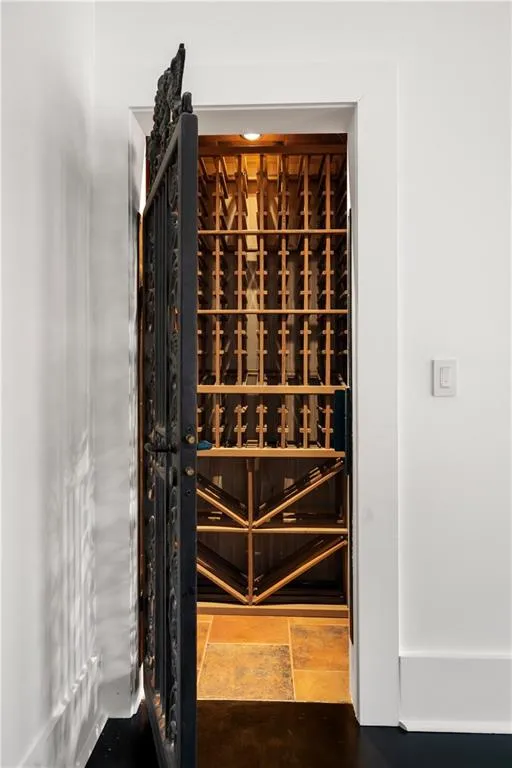 Wine area with stone tile floors