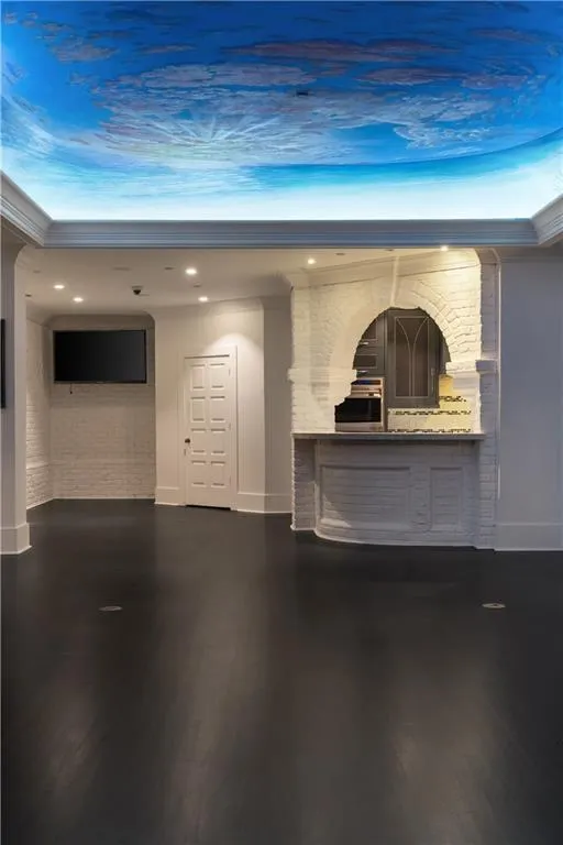 Reception area featuring recessed lighting and crown molding