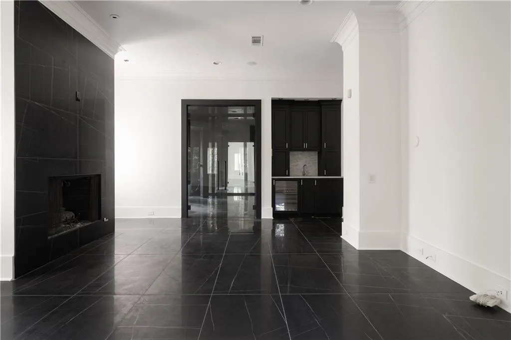 Full bath featuring tiled shower