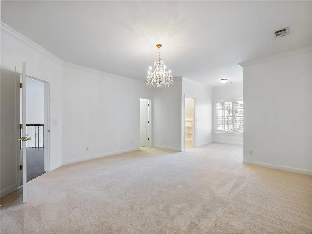 Large bedroom with two walk-in closets.