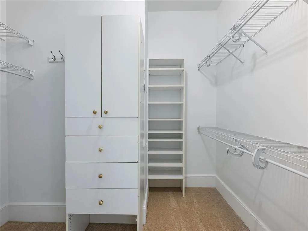 One of two large walk-in closets in primary