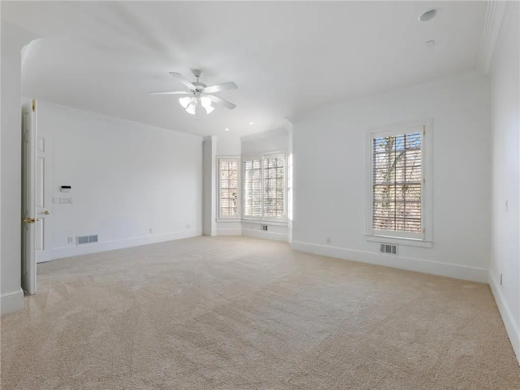 Large master suite with lots of natural light.