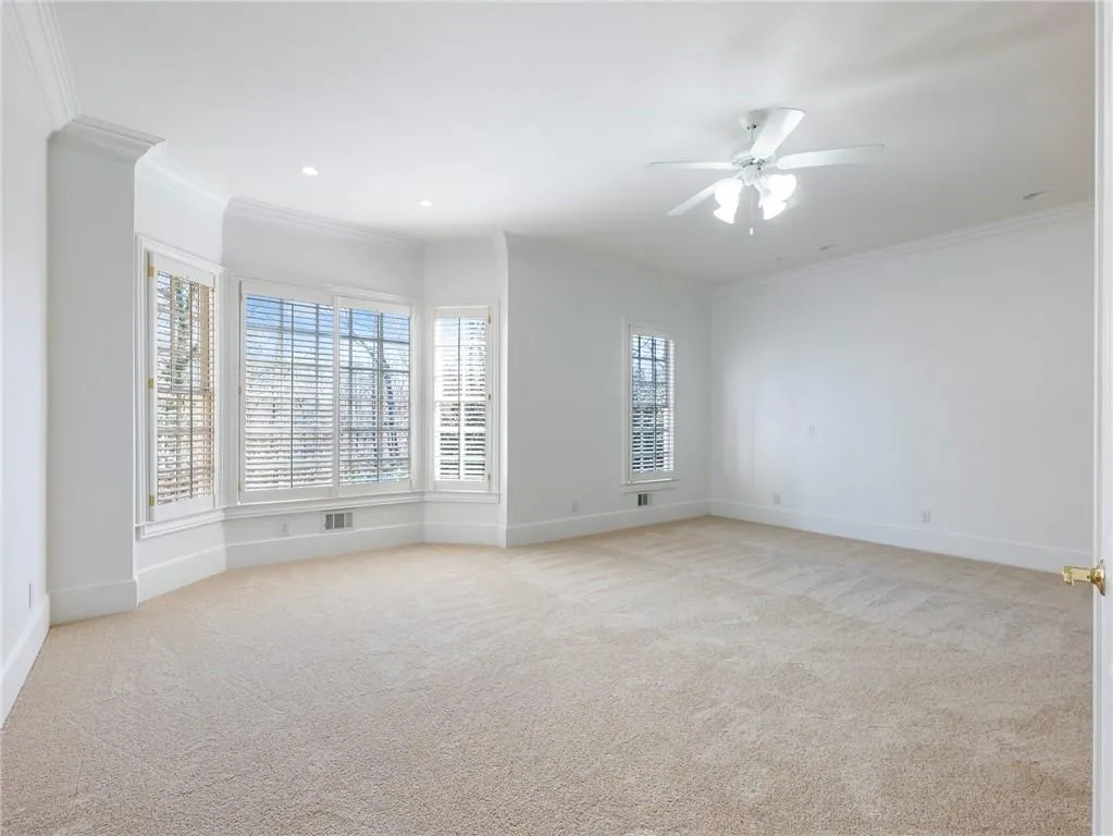 Primary suite has new carpet and is very large and bright.