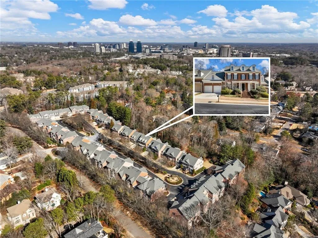 Bird's eye view of subdivision with King and Queen building in background.