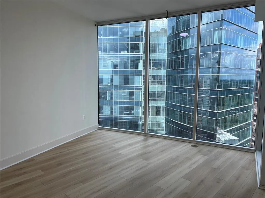 Secondary Bedroom Floor to Ceiling Glass Windows