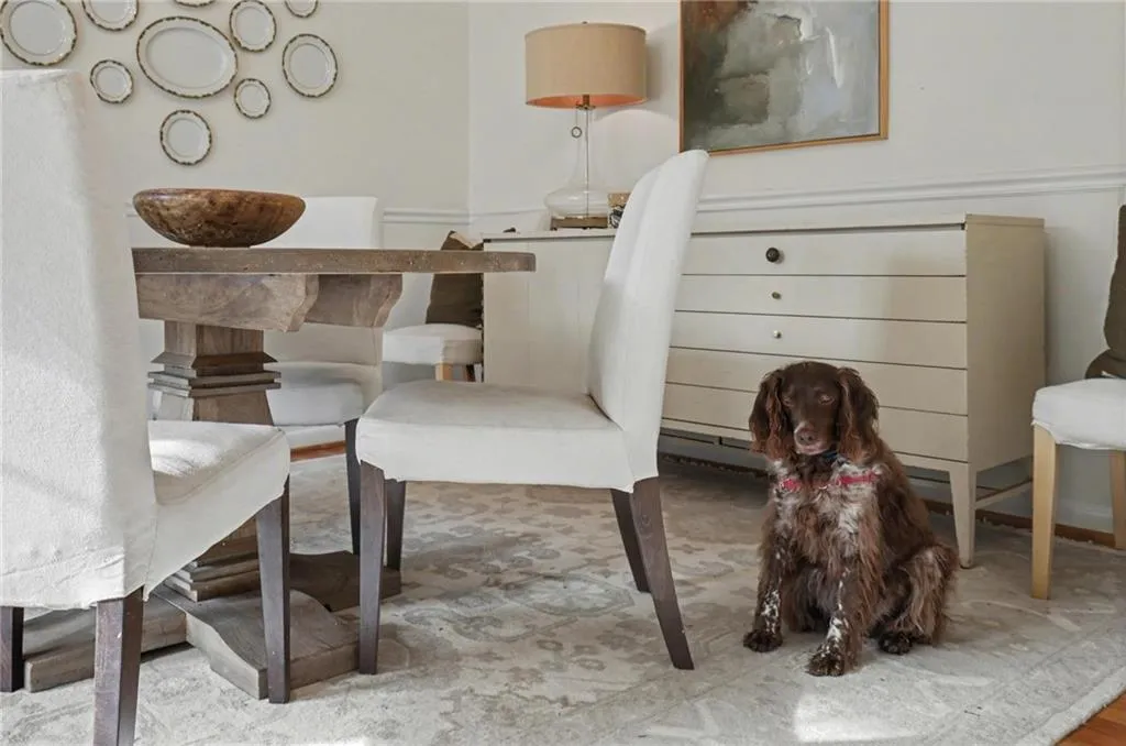 Dining Room.  Sweet dog does not convey with home!