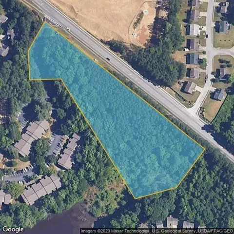 Aerial view of property's location with property parcel outlined