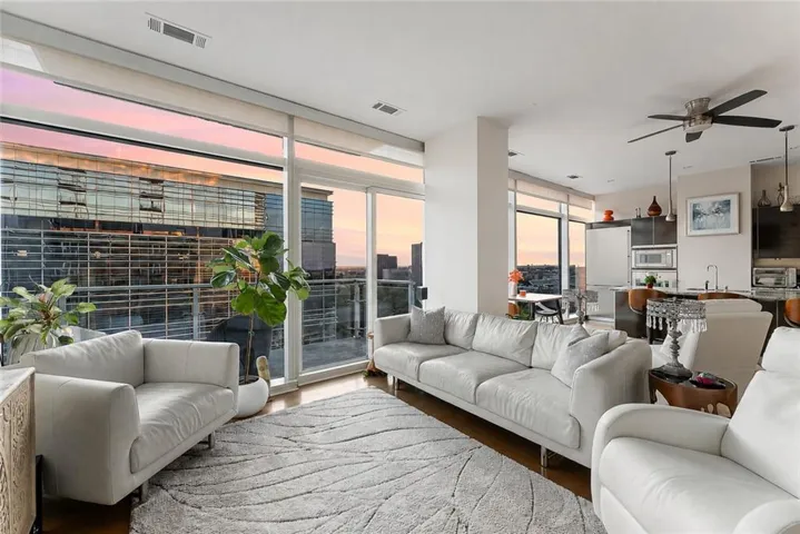 Enter to an expansive, light-filled panoramic view.