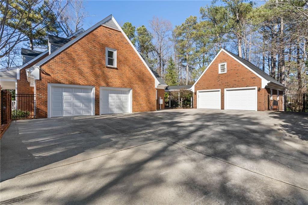 4 car garage (2-car attached and 2-car detached with covered walk)
