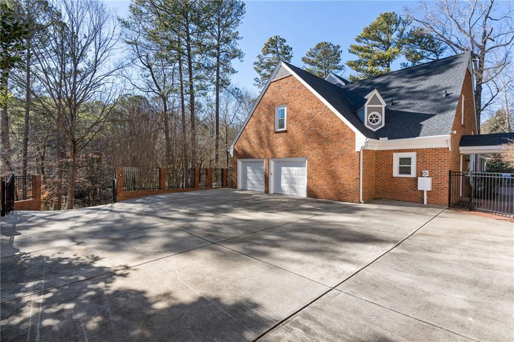 Ample additional parking and turn around space. Privacy gate.