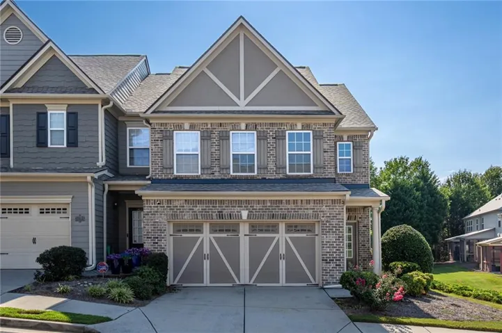 Brick and siding exterior with gabled roof lines