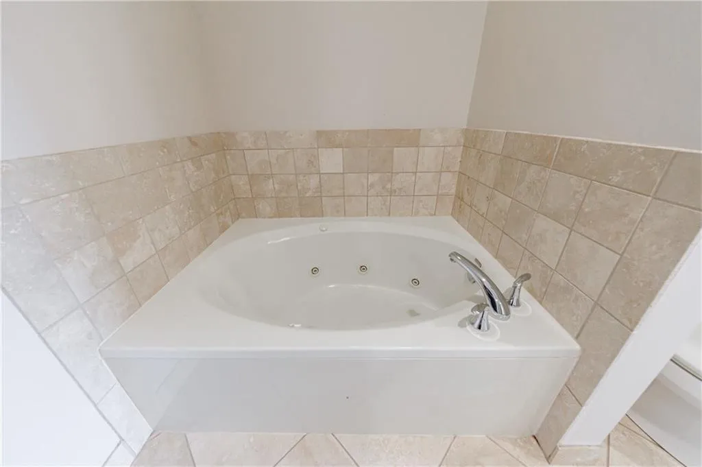 Soaking tub in primary bathroom