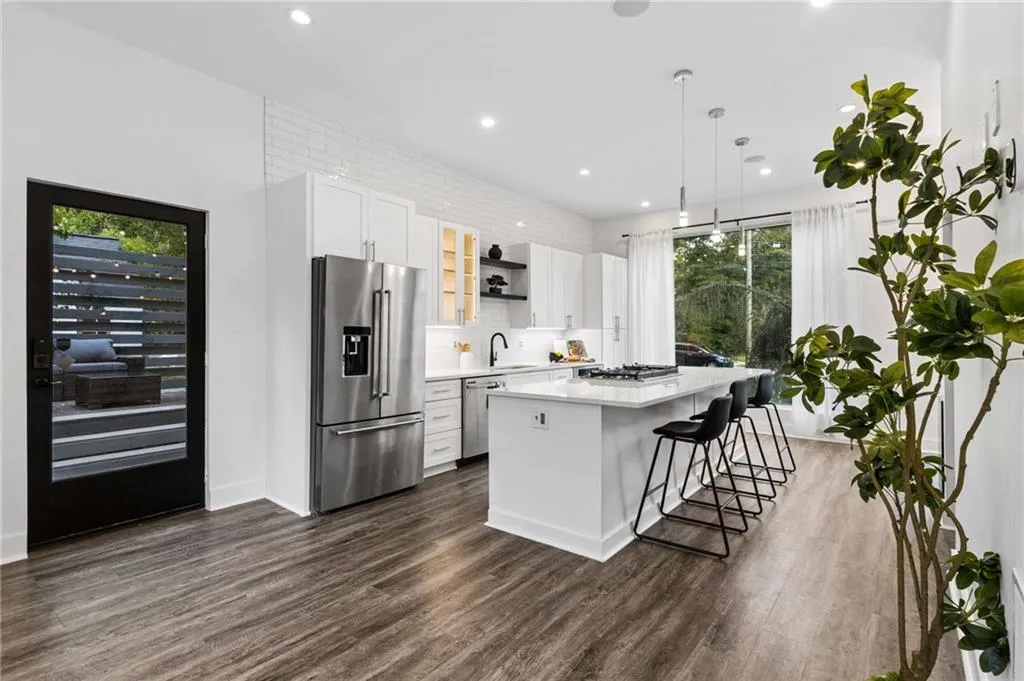 kitchen with elevator access and back deck