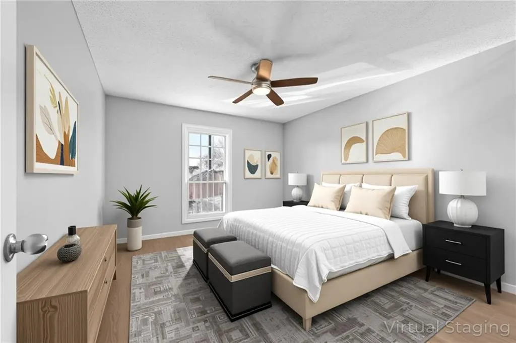 Bedroom with wood finished floors, a ceiling fan, and a textured ceiling